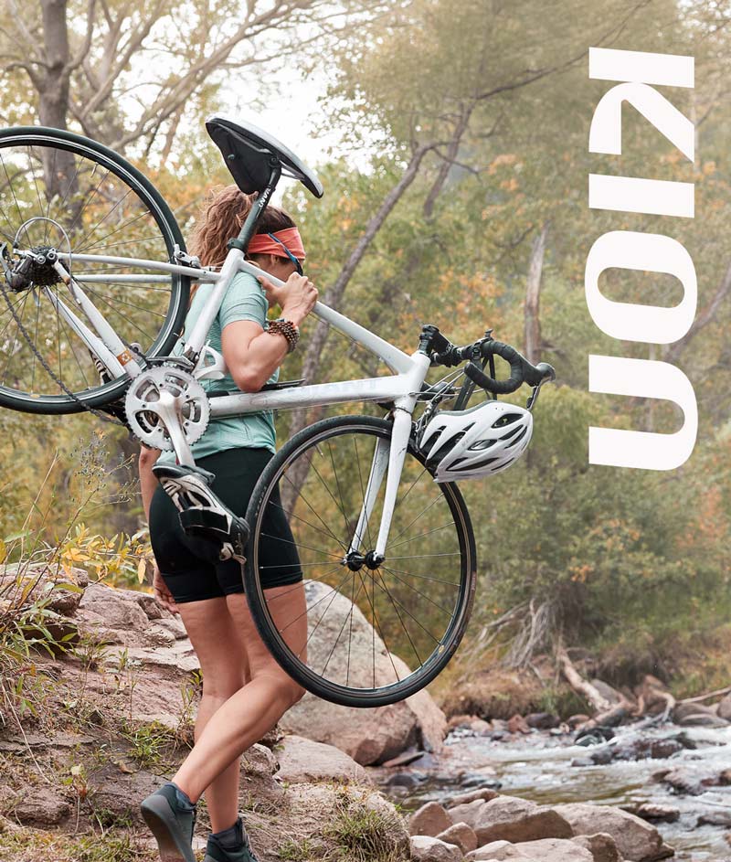 Women carrying a bike