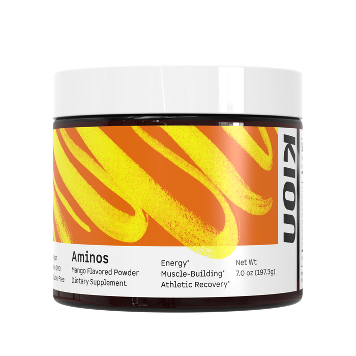 A container of Kion Aminos Powder with a yellow and orange design, labeled as 'Mango Flavored' and indicating it is a dietary supplement for energy, muscle building, and athletic recovery. #flavor_mango_powder