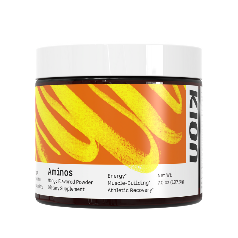 A container of Kion Aminos Powder with a yellow and orange design, labeled as 'Mango Flavored' and indicating it is a dietary supplement for energy, muscle building, and athletic recovery. #flavor_mango_powder