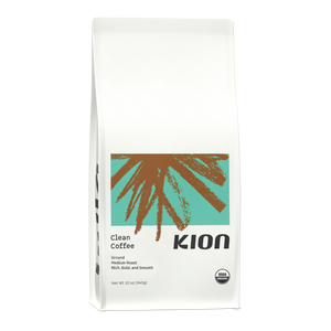 A package of Kion Clean Coffee, which is a medium-fine grind coffee. The packaging is predominantly white with a teal blue background and a graphic of a coffee plant. #flavor_ground - #flavor_ground